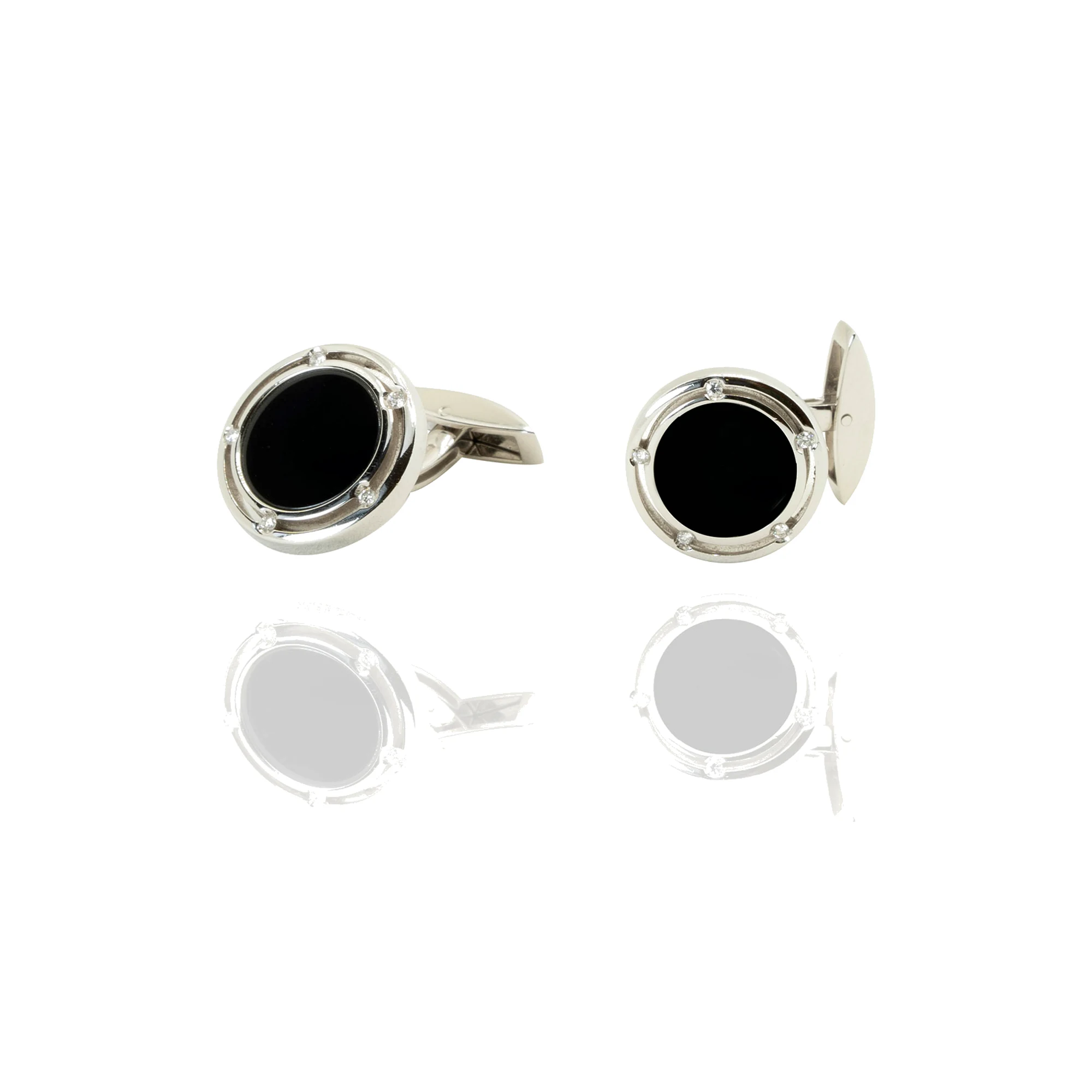 Gemelos Damiani oro blanco ónix y brillantes