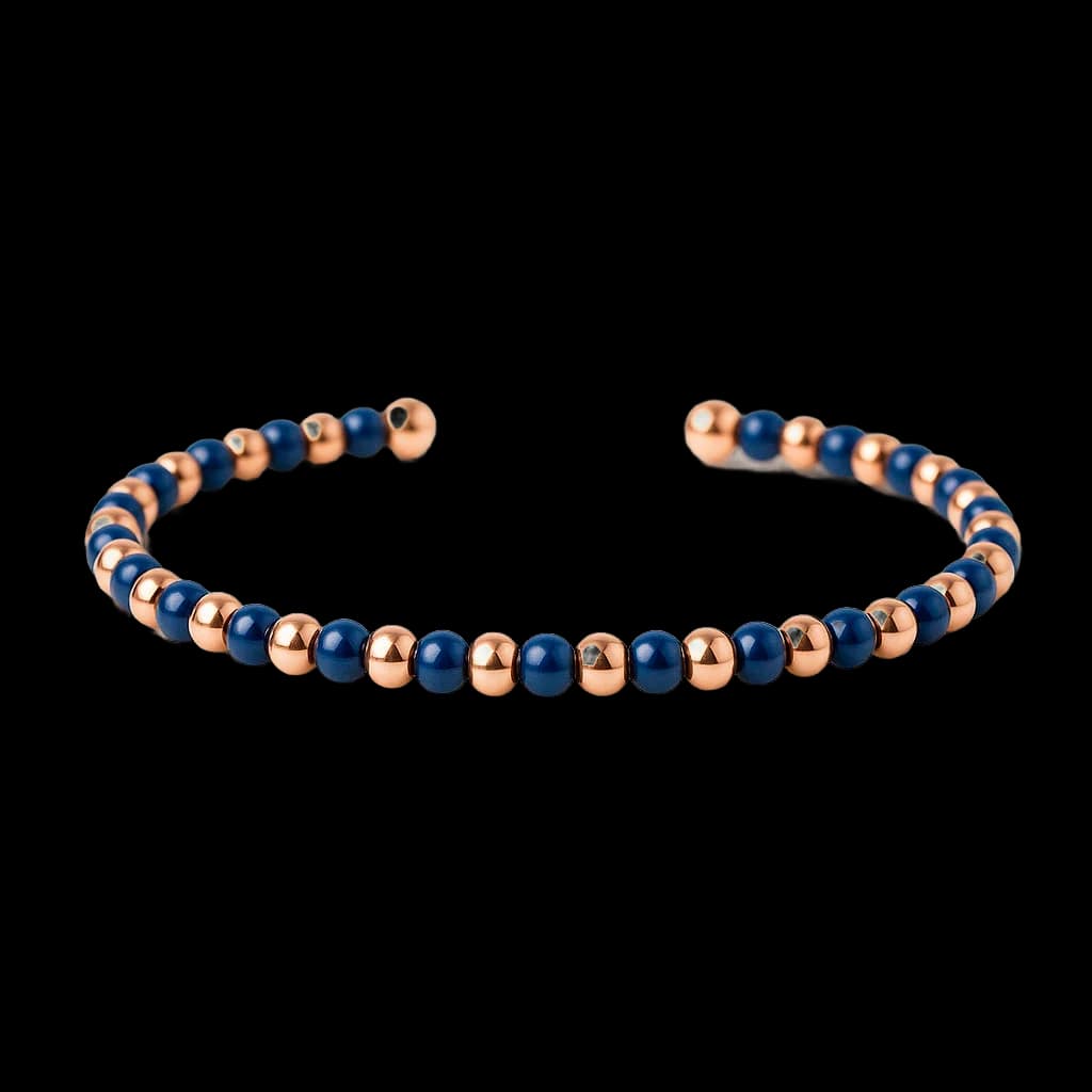 Pulsera bolitas oro titanio y cerámica azul