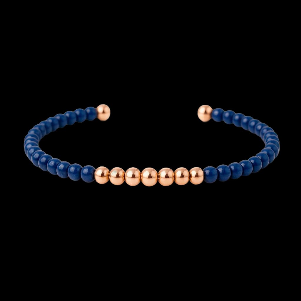 Pulsera bolitas oro titanio y cerámica azul